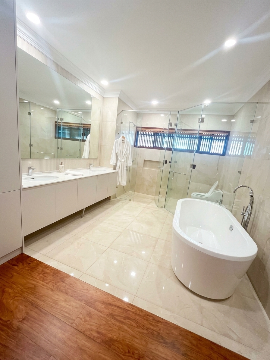Ensuite bathroom with freestanding tub and glass shower