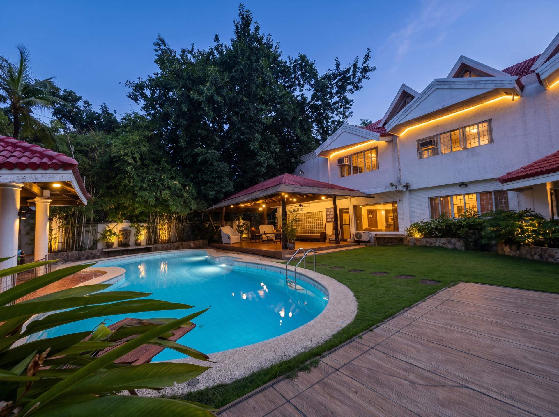 Pool, gazebo and garden at dusk — digitally enhanced