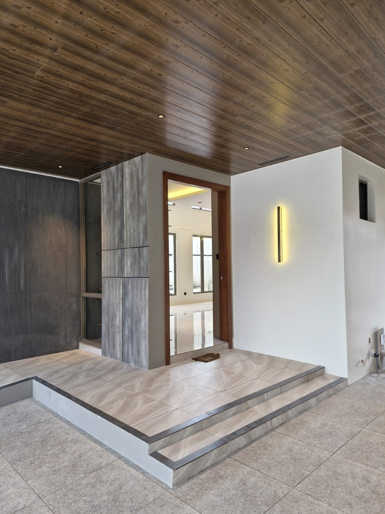 Entrance steps and covered foyer