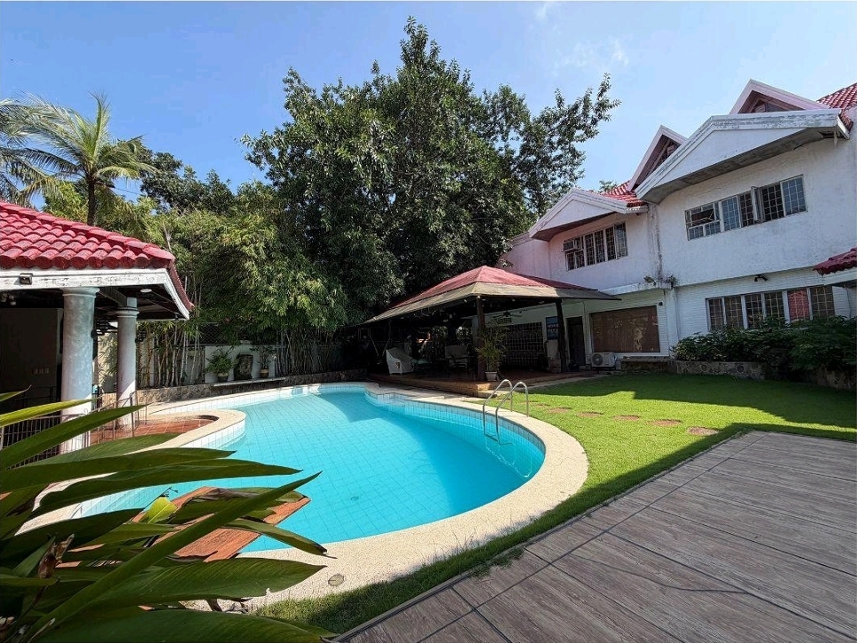Original daytime pool and garden of the BF Homes estate