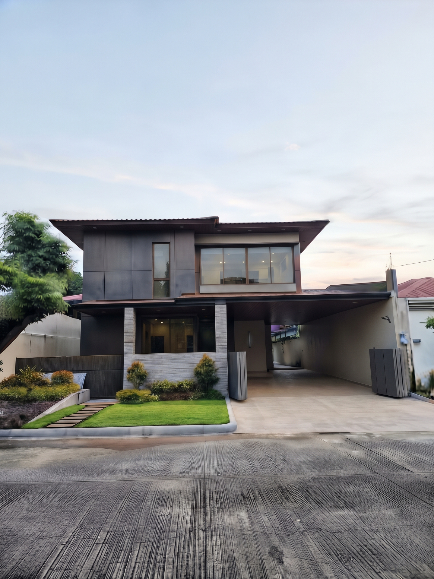 Daytime front facade with three-car garage and driveway