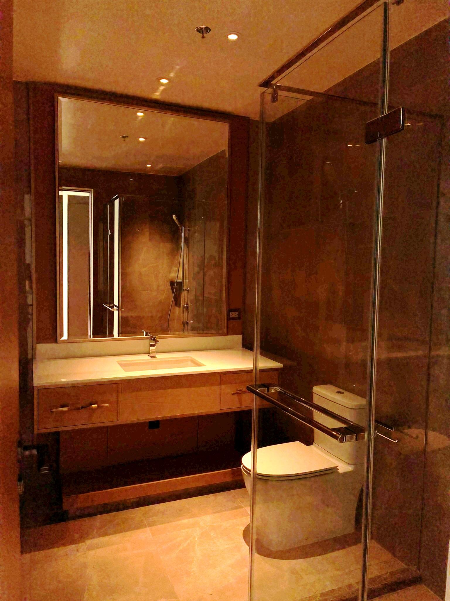 Third bedroom bathroom with vanity and glass-enclosed shower