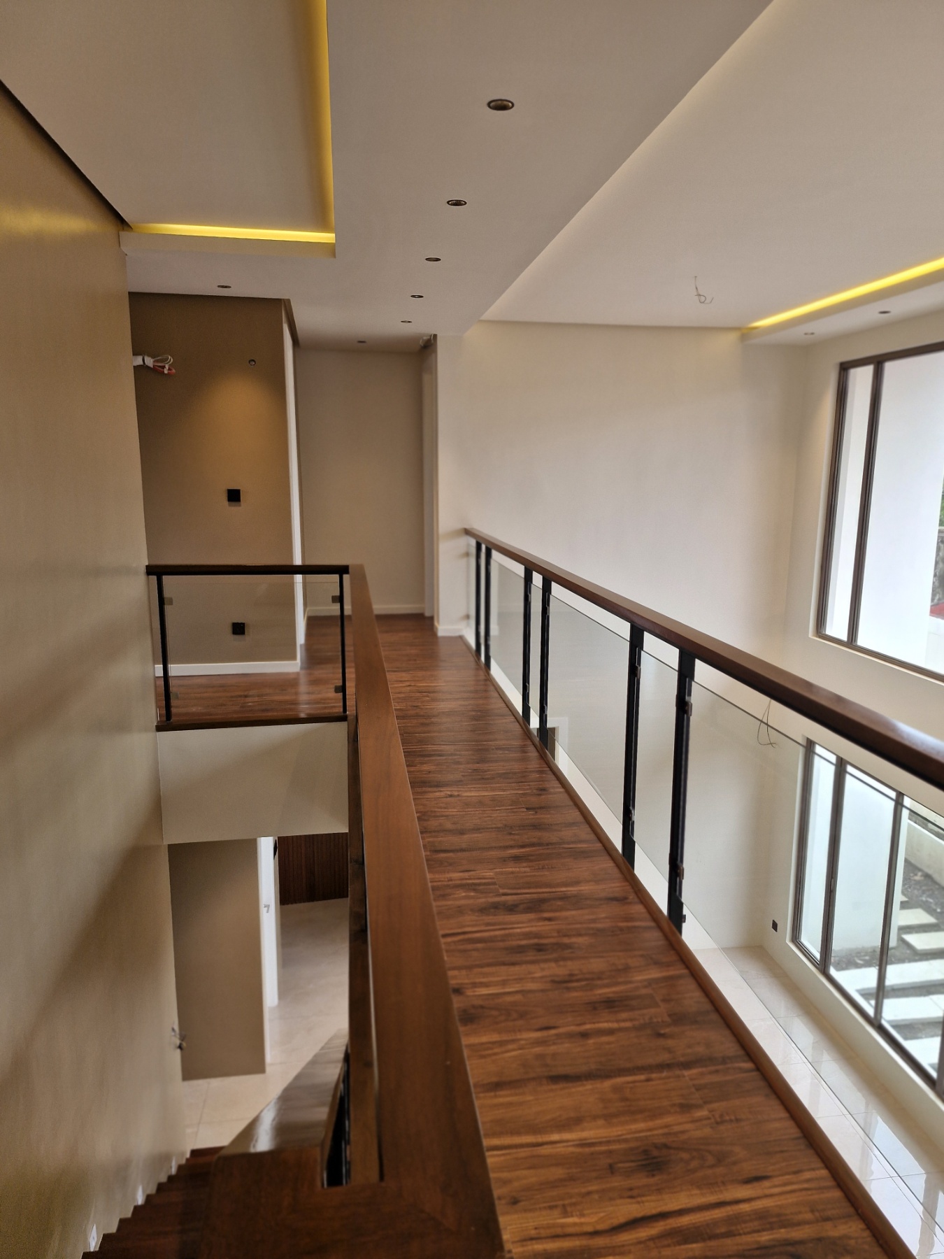 Upper hallway overlooking the living and dining rooms
